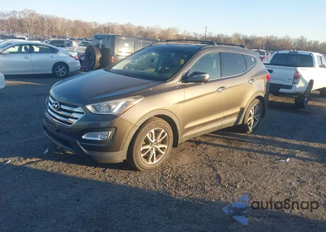 2014 Hyundai Santa Fe Sport 2.0L Turbo z USA, uszkodzony, nr VIN 5XYZUDLA2EG185290